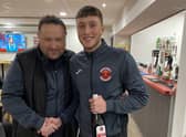 Chris Rawlinson presents hat-trick hero Dec Johnson with his man-of-the-match award on Saturday. (Photo: Skegness Town FC)