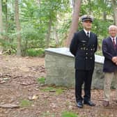 Simon Elmer (centre) at the memorial in Poland with friend Anna Stalmierska and Lieutenant Robert Dusza.