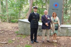 Simon Elmer (centre) at the memorial in Poland with friend Anna Stalmierska and Lieutenant Robert Dusza.