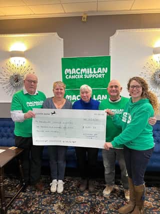 Graham Beauchamp, Julie Waby, Jennie Beauchamp and Paul Bell presenting the cheque to Ingrid Ashton from Louth Macmillan Fundraising group.