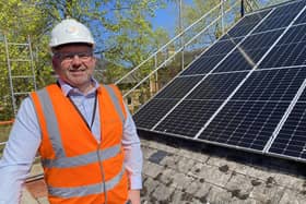 Coun Richard Wright pictured during the recent installation of more solar panels on NKDC's office roofs. Photo: NKDC