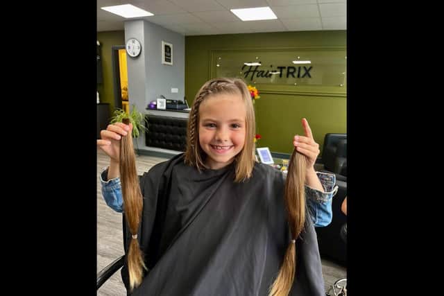 Lily has cut her hair for the Little Princes Trust.