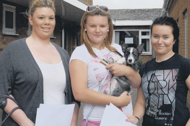 The Giles Academy's (from left) Nicola Taylor, Lauren Wright and dog Taz, and Olivia Wise.