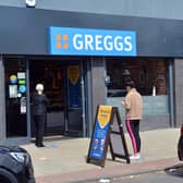 Queues gather for the reopening of Greggs