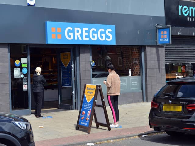 Queues gather for the reopening of Greggs