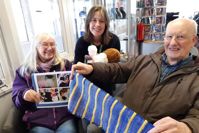 Christine and Paul Scrivin with library manager Kay Turnbull (centre)