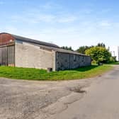 Land and buildings at Field House Farm, Scotter, are up for sale