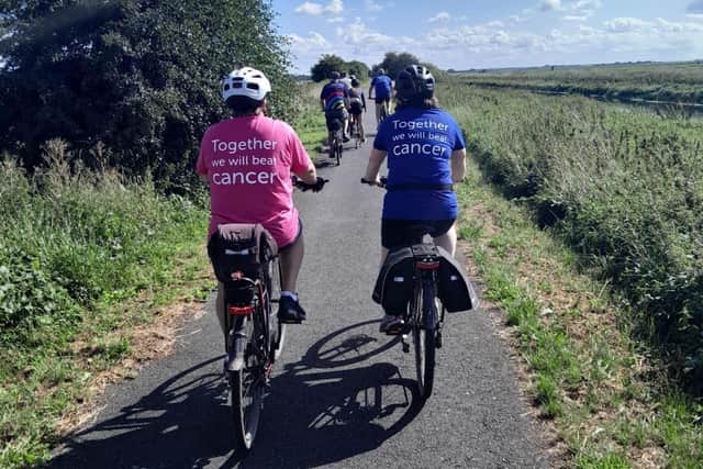 Charlotte (right) cycling alongside Sher Hesketh.