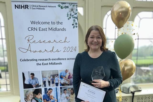Tracy McCranor with her award