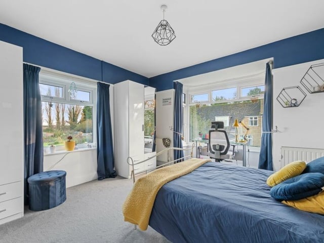 Another one of the four bedrooms.