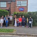 Parents and children outside the Viking School, Skegness, which has closed.