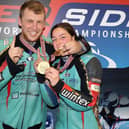 Todd Ellis and Emmanuelle Clement celebrate their title win. Photo: Wally Walters.
