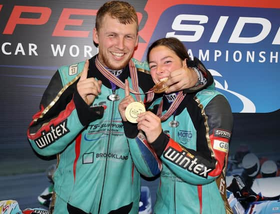 Todd Ellis and Emmanuelle Clement celebrate their title win. Photo: Wally Walters.