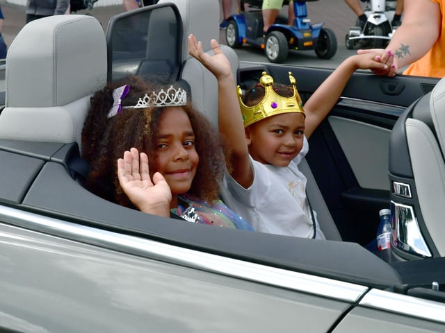 Chapel St Leonards Prince and Princess Aaron Rose, 6, and Ella Duncan-Cramp, 10, travelled in an open top sports car.