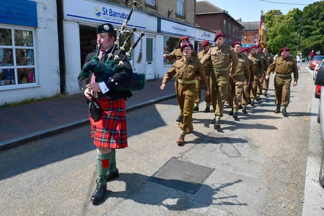 Parading through Ruskington after the service.