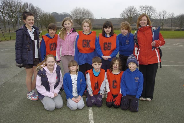Welbourn Primary School's team, with team managers Casey Parker and Maria Cotton and teacher Jo Brown.