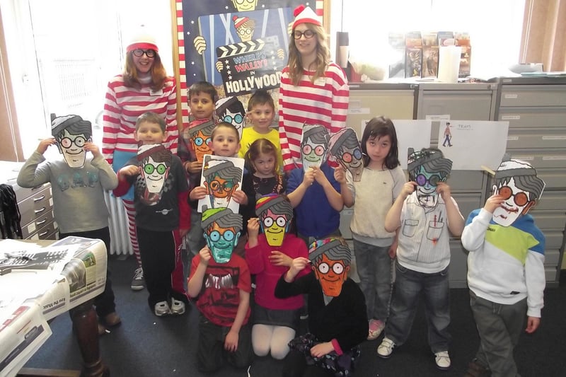 Youngsters had fun creating Where's Wally? masks at Boston Library during the Easter holidays 10 years ago. Pictured with the children were staff Rosie Self and Louise Worth.