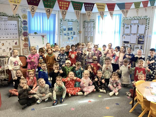 Pupils at the Richmond School in Skegness raising money for Red Nose Day by wearing pyjamas.
.