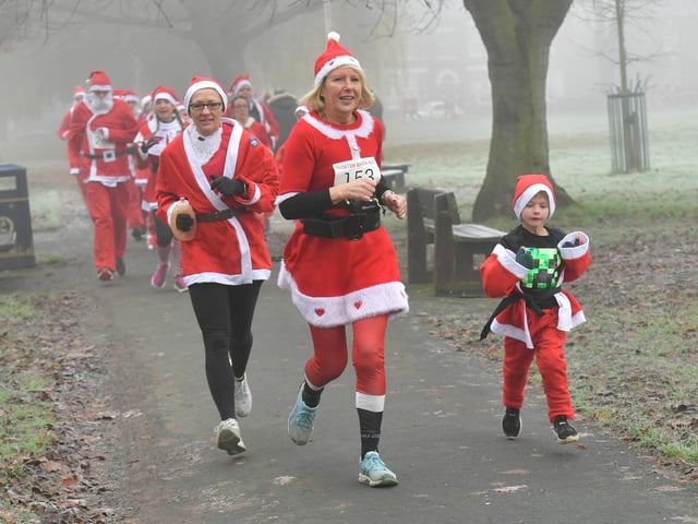 Action from this year's Boston Santa Run.