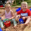 Camirah Borman and Archie Carlon, of Boston, playing at the beach in 2022.