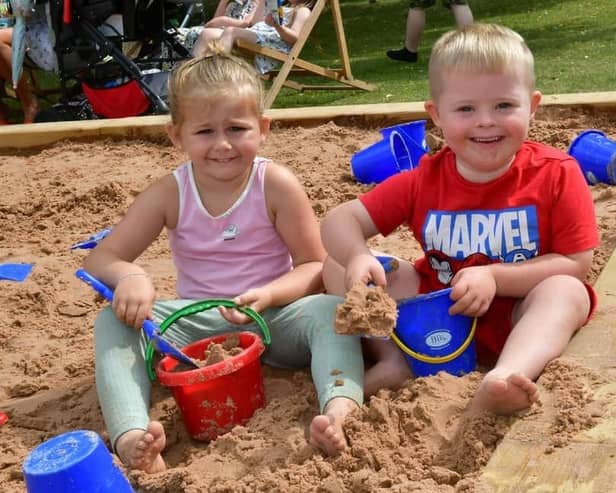 Camirah Borman and Archie Carlon, of Boston, playing at the beach in 2022.