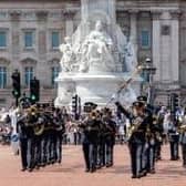 RAF bandsmen and women performing in London outside Buckingham Palace. They are shortlisted for an award from the RAF Benevolent Fund for their service to the charity.