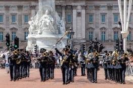 RAF bandsmen and women performing in London outside Buckingham Palace. They are shortlisted for an award from the RAF Benevolent Fund for their service to the charity.