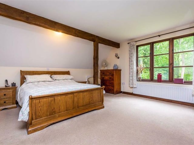 One of the five bedrooms.