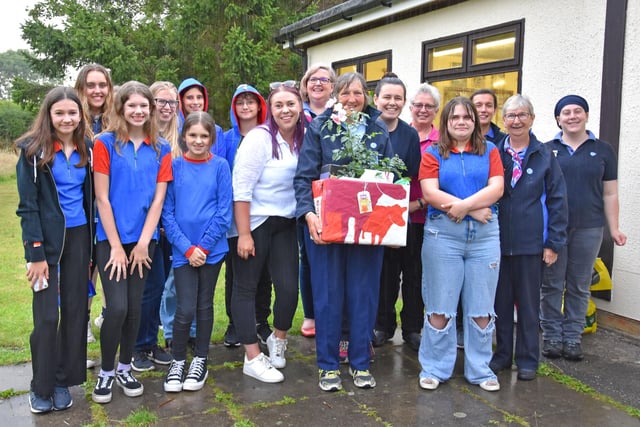 Jenny Bolton is retiring as a Guide Leader after 32 years service. She received gifts from Guiding friends in Wragby and Market Rasen Division. Image: John Edwards
