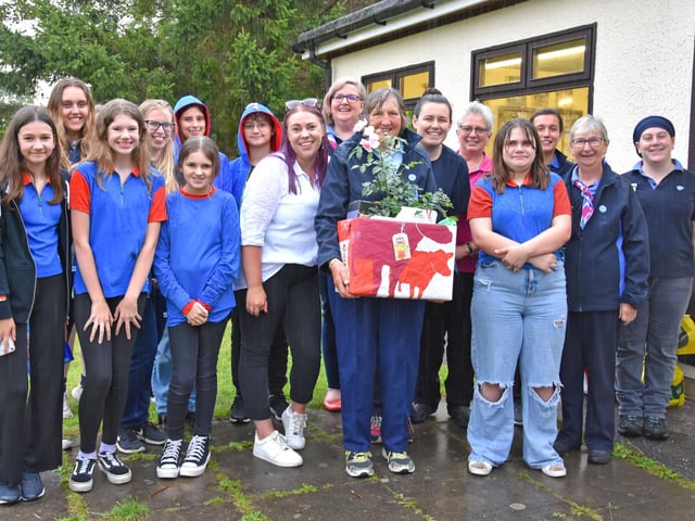 Jenny Bolton is retiring as a Guide Leader after 32 years service. She received gifts from Guiding friends in Wragby and Market Rasen Division. Image: John Edwards