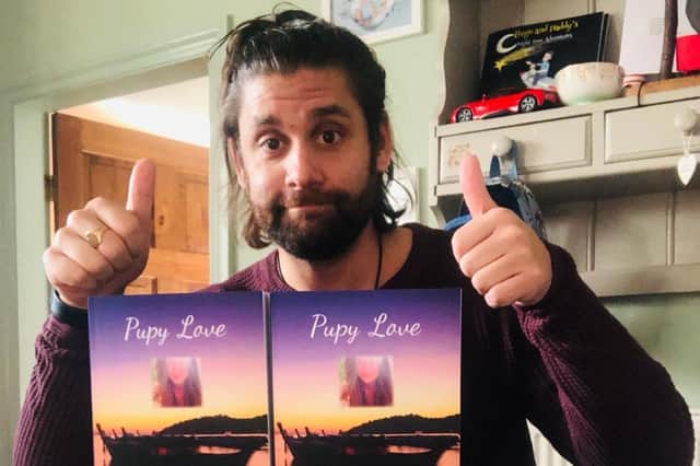 Ric Hart with copies of Pupy Love