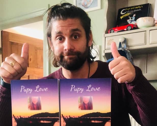 Ric Hart with copies of Pupy Love