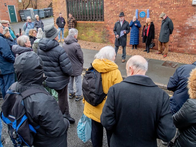 Around 50 people gathered for the unveiling.