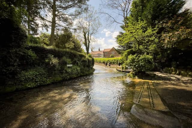 A typical, large puddle on the Watery Lane approach to the pub, which led to the nickname, 'The Splash'.