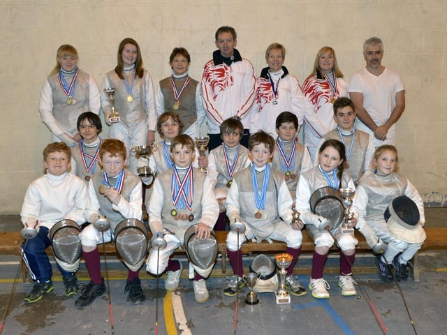 The junior section of Louth Fencing Club, newly crowned as regional league champions following an impressive medal haul in the fourth and last leg of the competition. Pictured, back row: Abbie Johnson, Emily Goolden, Kate and Jim Harris, Kim deLarge, Paula Webster, and John Stephenson; middle row: Archie Broughton, Robert Kemp, William Lonsdale, Hugo Fry, Luke Johnson; and front row: James Trevor, Sam Blair, Wilf Broughton, Joe Blair, Lottie Fry, and Caitlin Hall.
