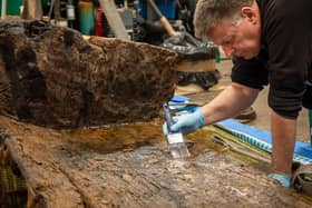 Ian Panter, Head of Conservation at York Archaeological Trust, pictured with the coffin. (Photo: York Archaeological Trust)
