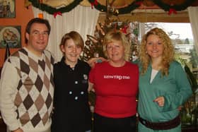 A Christmas family photo. From left, Nigel, daughter Yasmin, Kim and daughter Sophie.