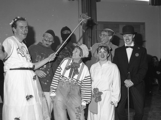 Headmaster Robert Dring (left) waving his wand in the hopes of encouraging a performance of sheer magic from his staff in the comic relief netball match against pupils.