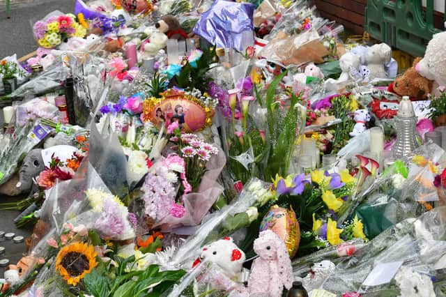 Floral tributes left at the scene of Lilia's alleged murder in Fountain Lane, Boston