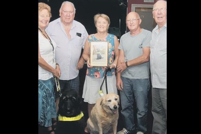 The Liberal Club of Skegness is pictured presenting £2,100 to the local branch of the Guide Dogs for the Blind Association. The money was raised through raffles and other fundraisers. It was the largest sum the branch had received in its three-year history.
