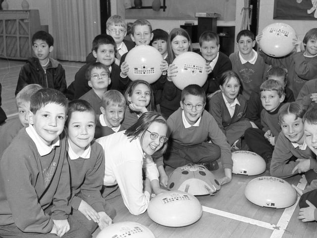 A group of pupils from the Boston area taking part in a new after-school maths scheme. Thirty children attended the inaugural session, held at Staniland Primary School, in Boston. The other schools involved were Boston St Mary's, Park, and Sibsey Free. Youngsters are pictured getting to grips with robotic machines called Roamers.