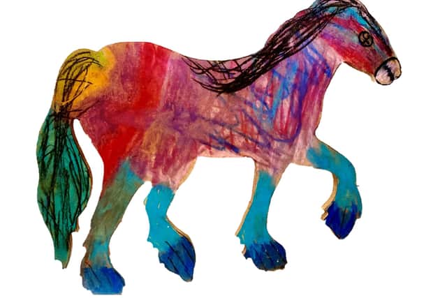 Wooden horse decorated by local children for the Horse Fair Trail. Credit: HHHS