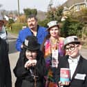Dee'Dee Lee and her family with the Deputy Mayor of Skegness doing something funny for money for Comic Relief.