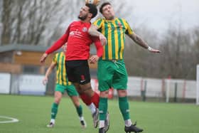 Skegness match-winner Gary King goes up for a header at Eastwood on Saturday. Photo: Jason Chadwick.