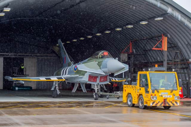 The new Typhoon is pulled from the hangar.