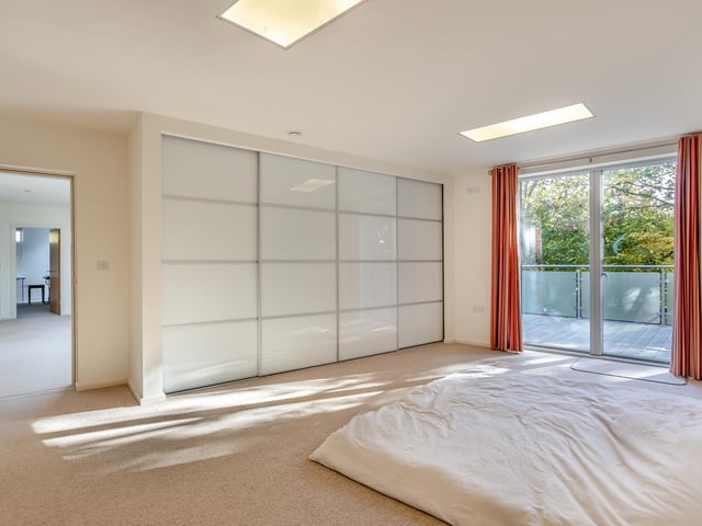 The principal bedroom and ...