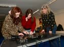 Esther Gravett and Sara Cunningham with workshop leader, Jo Roberts (right).