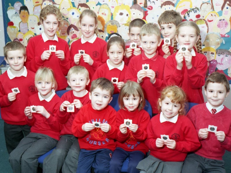 Pupils from Staniland Primary School Boston showing off the Millennium medals presented to them by the Mayor of Boston.