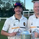 Barend Lourens and captain Jason Collinson with the league trophy.