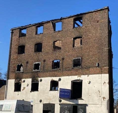 Boston Borough Council is warning people that the gutted warehouse building on London Road is in danger of collapsing.